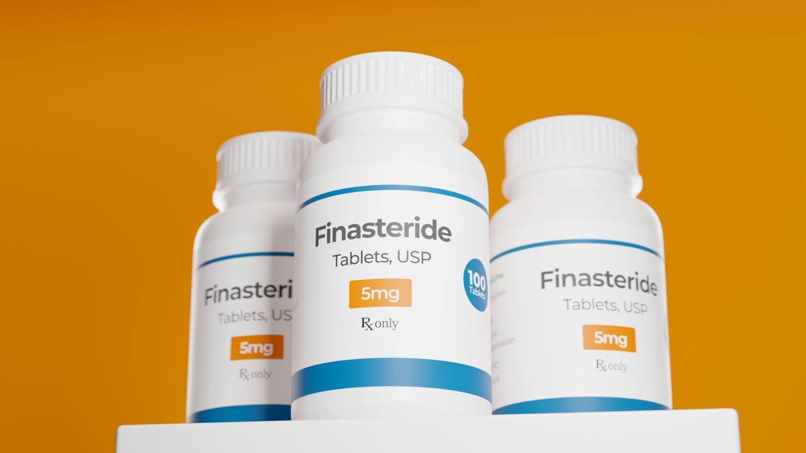 Finasteride tablets bottles against the orange background.