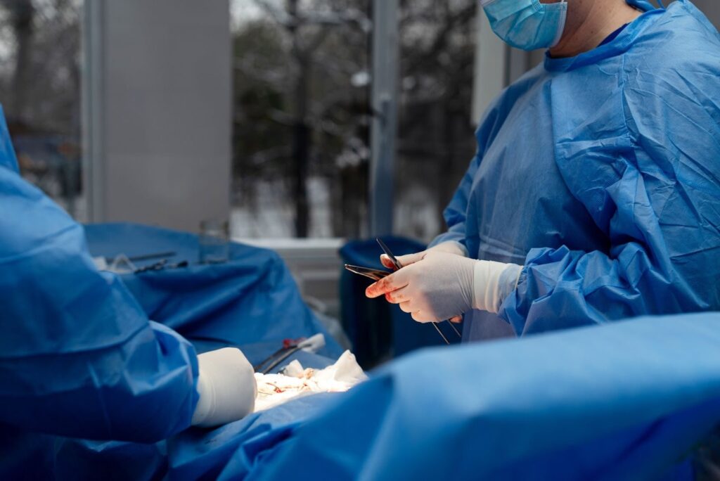 A surgical team during a hernia repair procedure.
