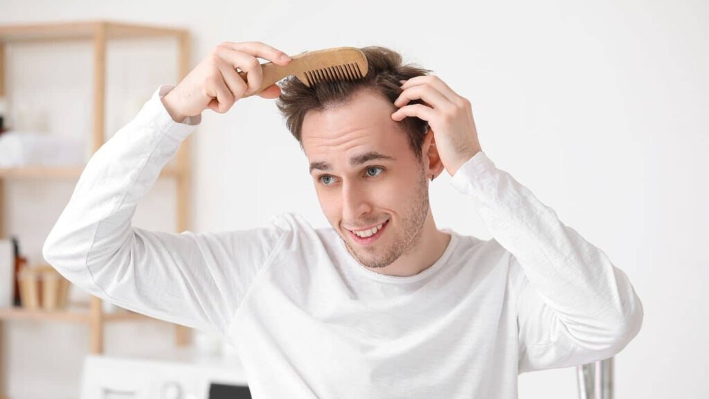 A person with a successful stem cell hair treatment