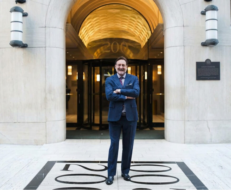 Dr. John P. Cole in front of the Forhair clinic in New York